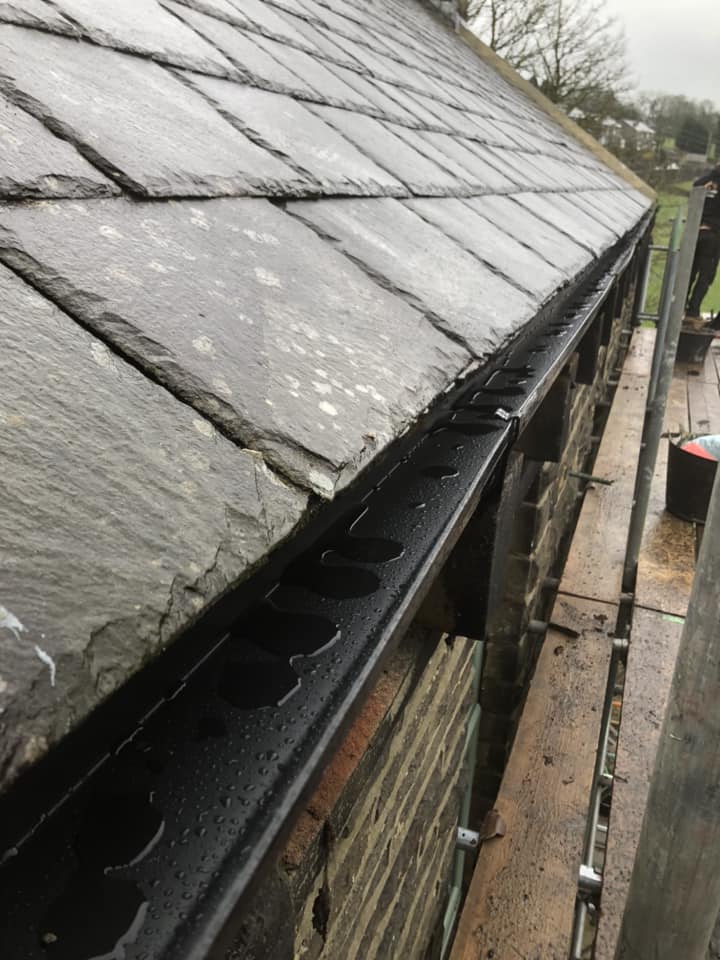 Guttering installation and repairs by JLR Smith Roofing Leeds