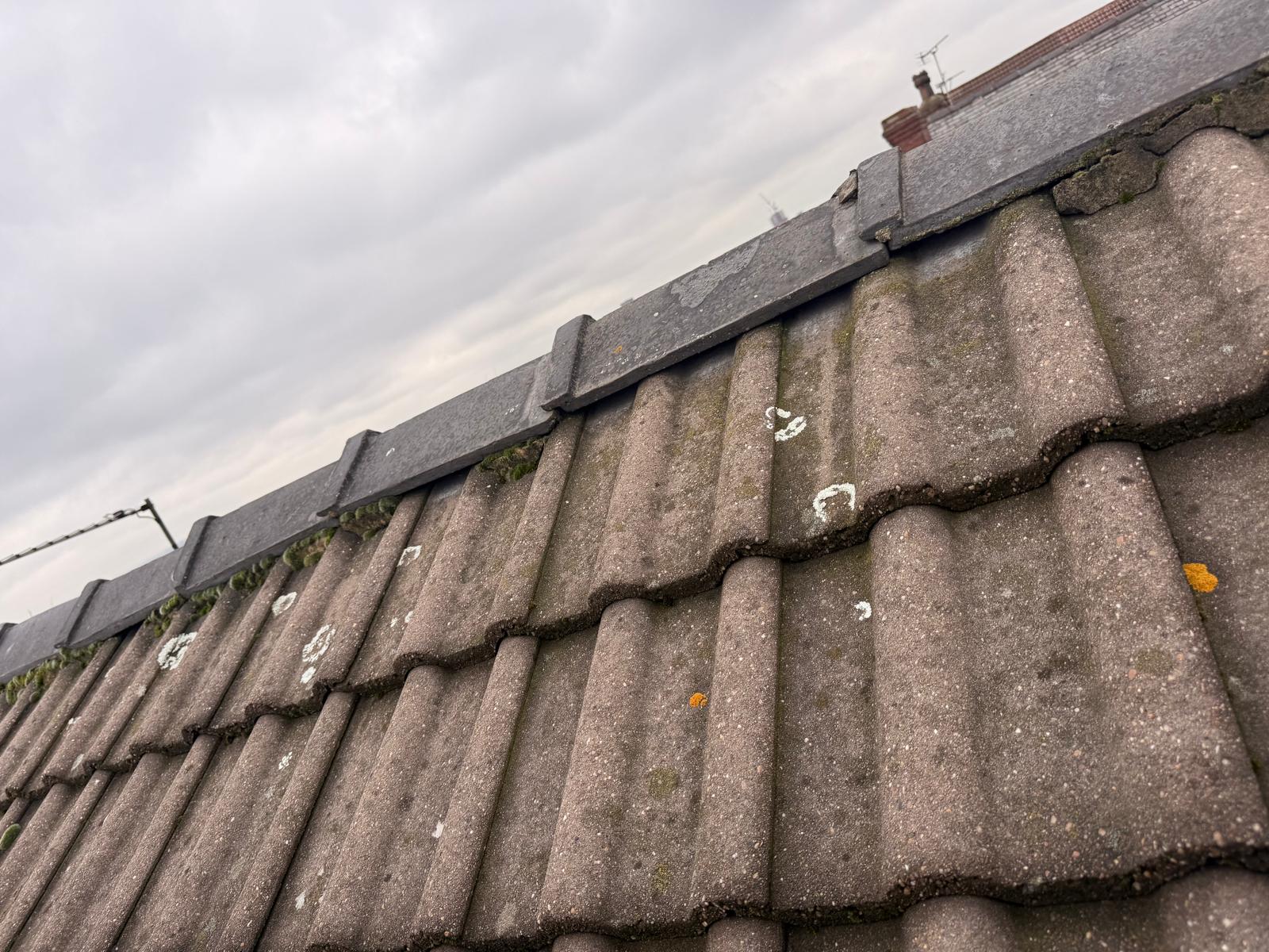 New dry ridge tile system installed on concrete tile roof in Leeds by JLR Smith Roofing